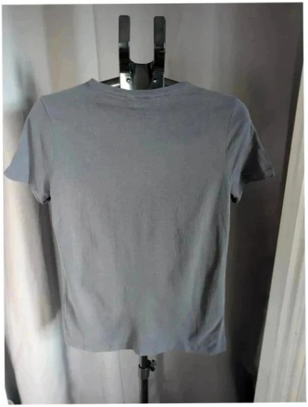 F&F grey graphic t-shirt featuring Guns N' Roses 1991 tour artwork in pink and green.
