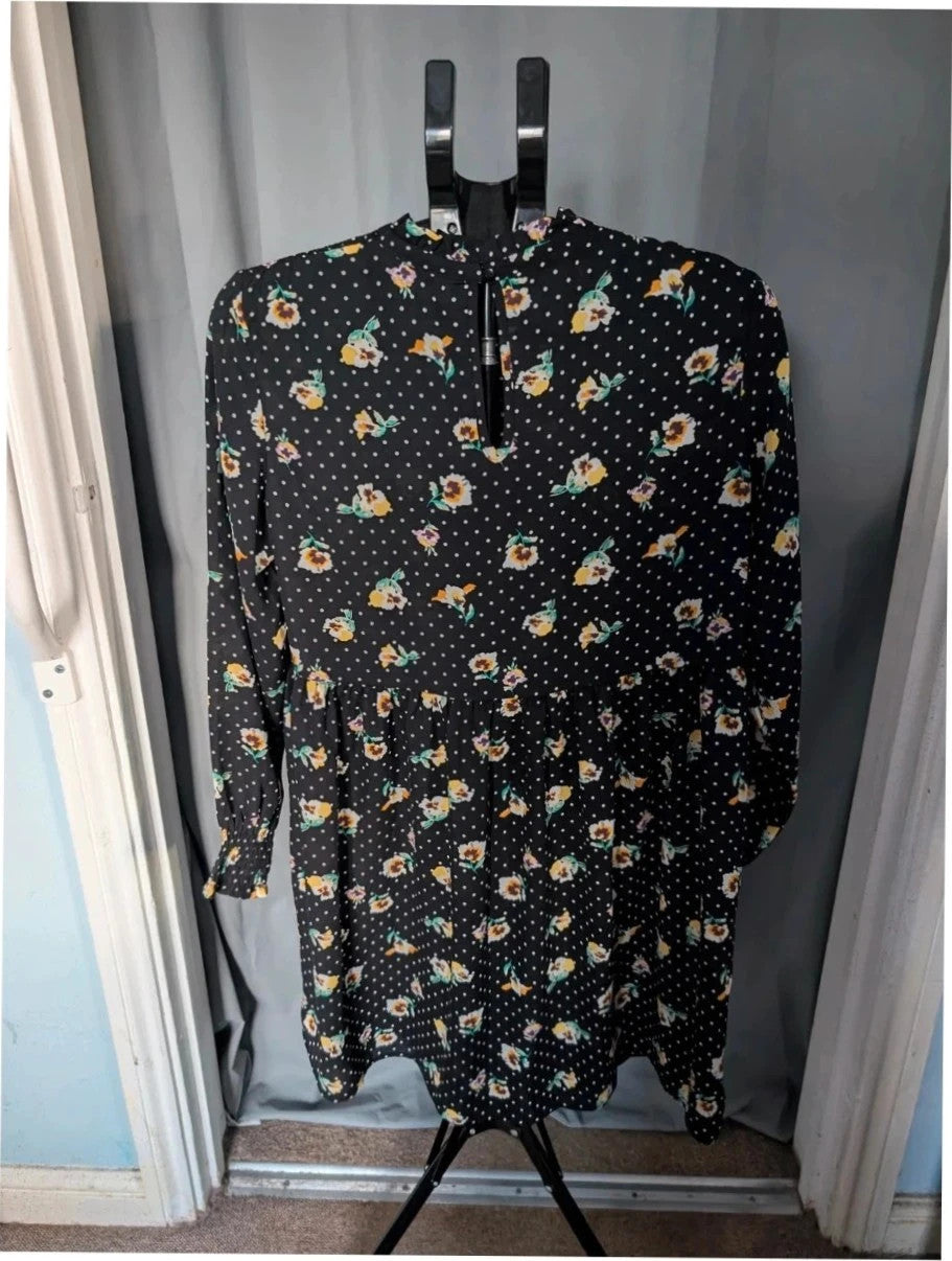 JDY black smock mini dress with floral and polka dot print, long sleeves, and keyhole back.