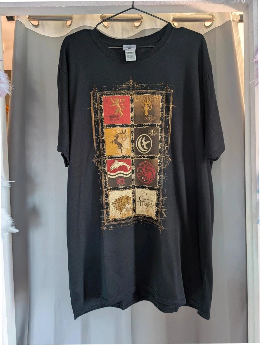 Game Of Thrones black graphic tee featuring house sigils print on soft cotton.