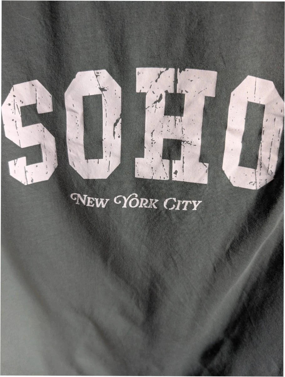 Primark green graphic t-shirt with distressed "SOHO New York City" print and ribbed neckline.