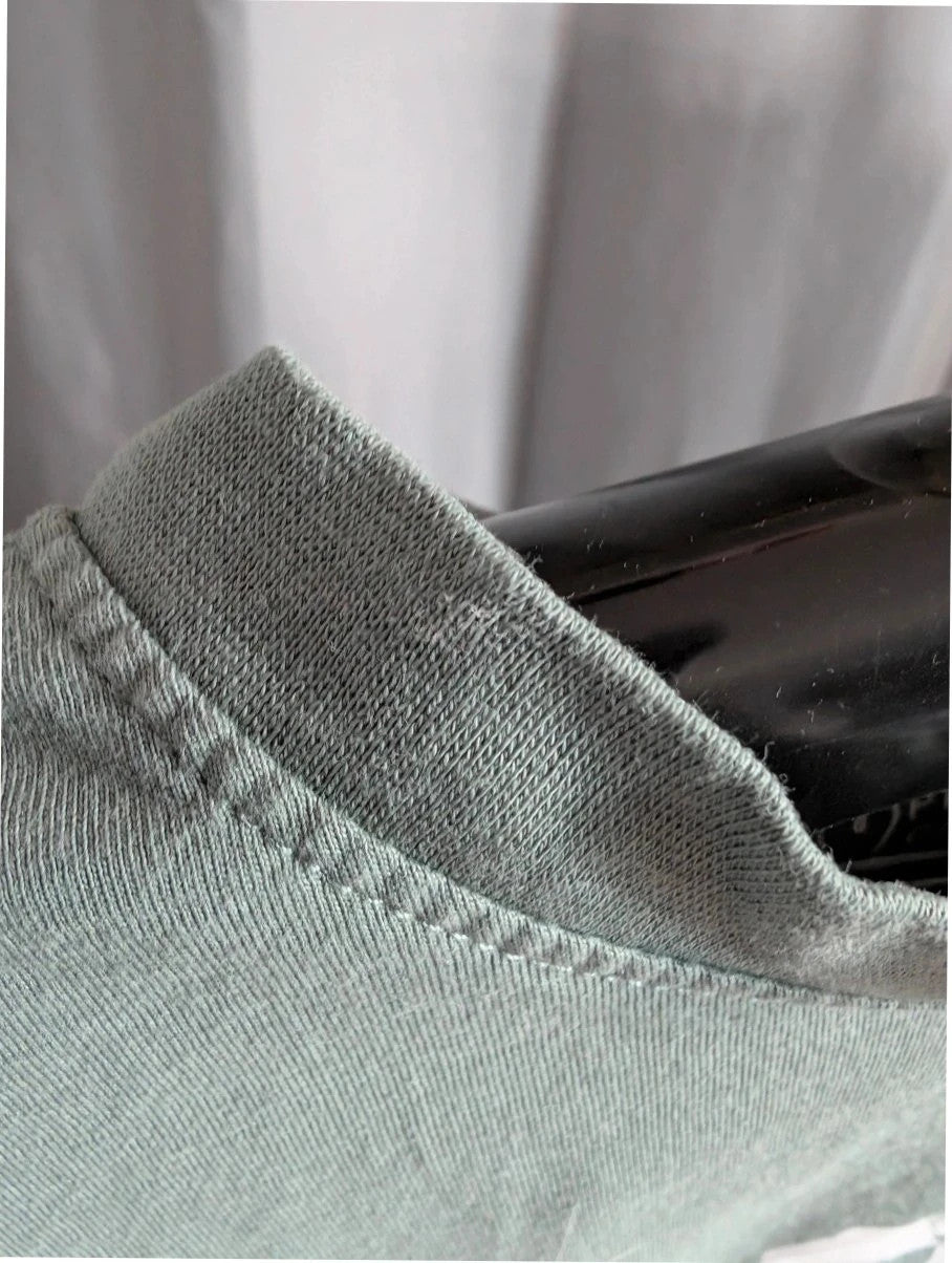 Primark green graphic t-shirt with distressed "SOHO New York City" print and ribbed neckline.