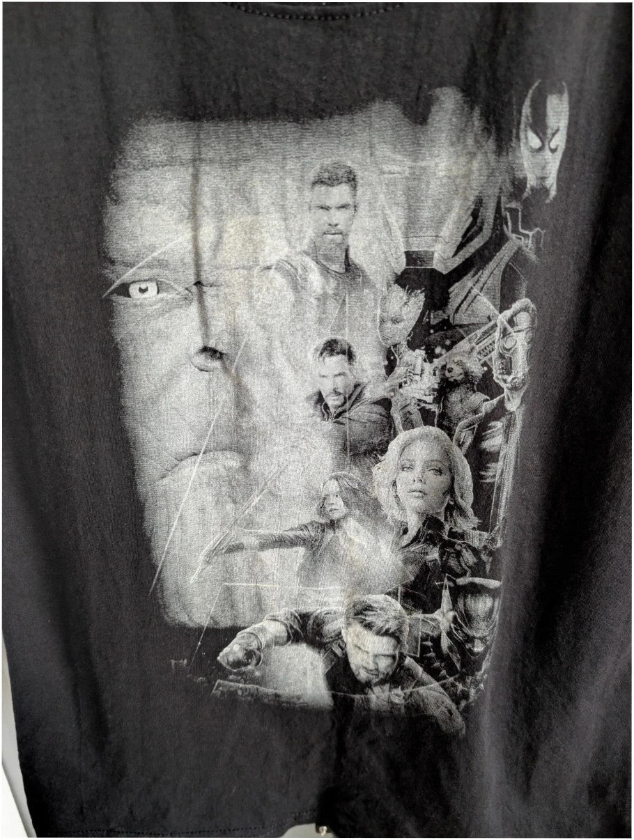 Marvel graphic tee black featuring Thanos and character collage in monochrome print.