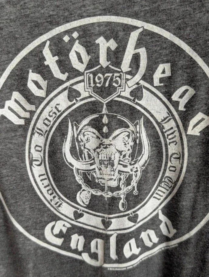 Motörhead grey graphic tee featuring Snaggletooth Warpig emblem and circular print.