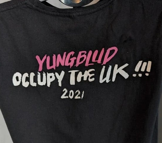 Yungblud black graphic tee with metallic silver portrait and neon pink tour lettering.