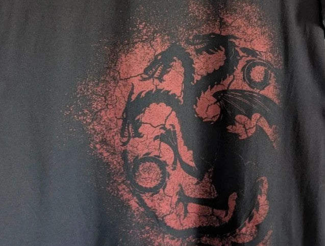 Game Of Thrones black graphic tee featuring distressed red Targaryen dragon sigil.