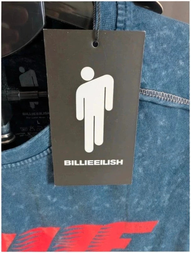 Billie Eilish blue acid wash pocket t-shirt with multicolour graphic and red text.