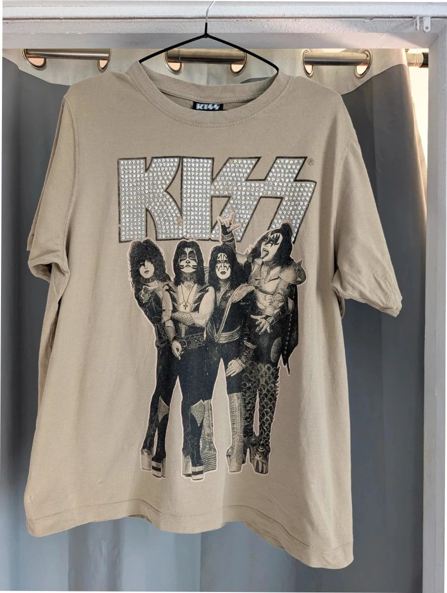 Kiss beige pocket t-shirt with rhinestone logo and band photo graphic.