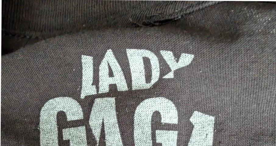 Lady Gaga black graphic t-shirt with white 'Fame Monster' print and crew neck.