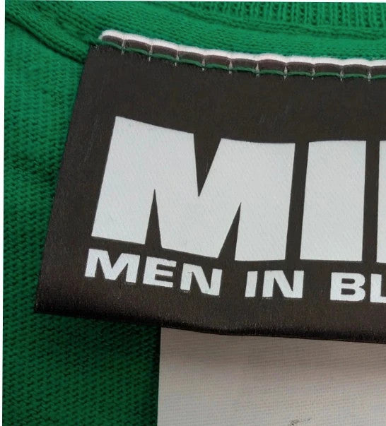 Gildan green graphic tee featuring Men In Black "Zap-Em Exterminators" logo and slogan.