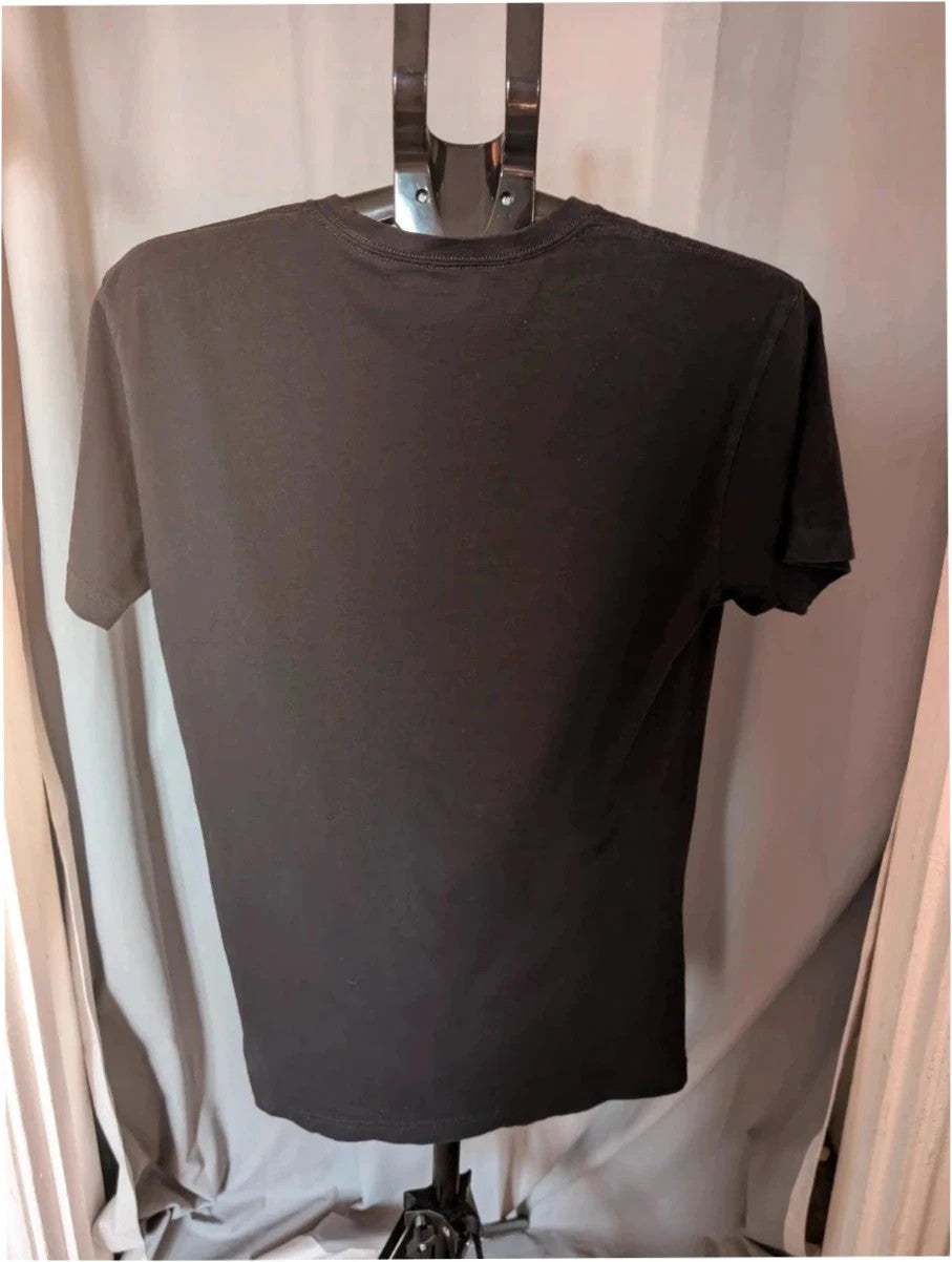 Next Level black graphic tee featuring Falling In Reverse pink logo and band portrait.