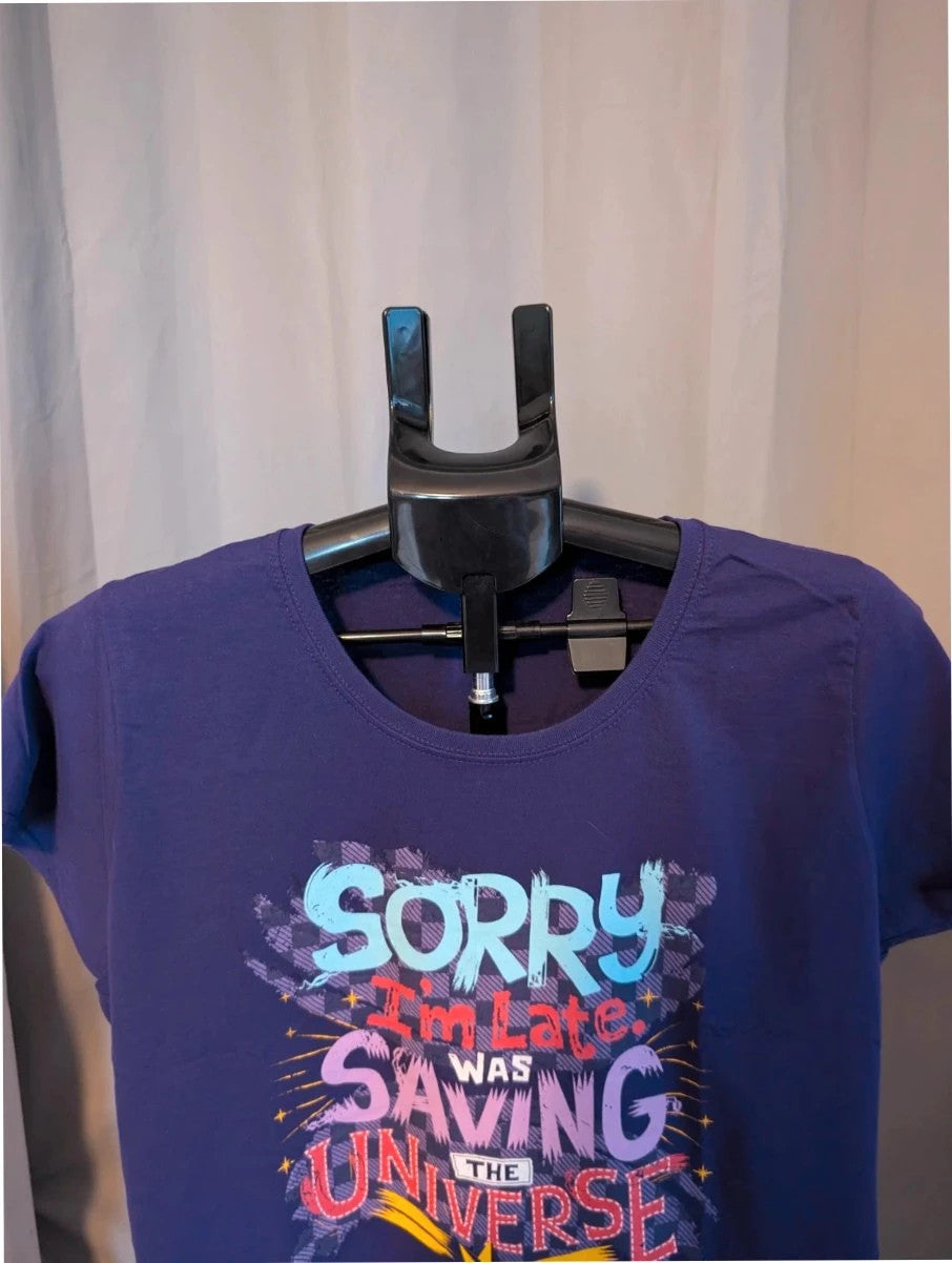 Marvel graphic t-shirt purple featuring "Sorry I'm Late" text and Captain Marvel star motif.