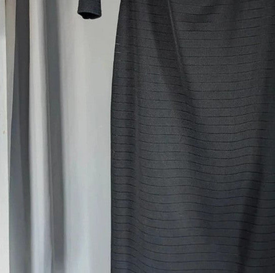 Miss Selfridge black bandage midi dress with cold shoulder cut-outs and gold zip detail.