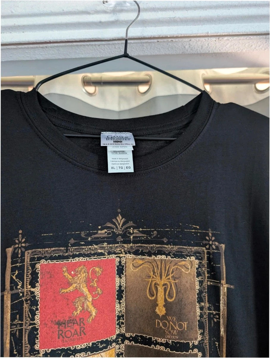 Game Of Thrones black graphic tee featuring house sigils print on soft cotton.
