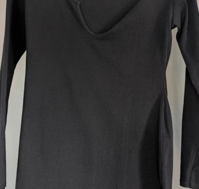 PrettyLittleThing black long sleeve bodycon mini dress with notch neck and fitted sleeves.