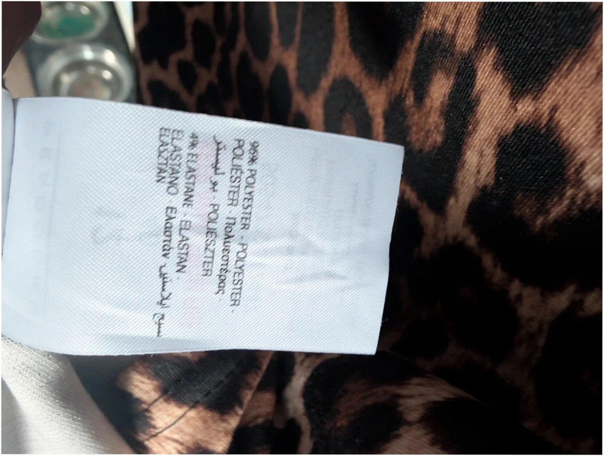 Peacocks leopard print shift mini dress in black and brown with short sleeves and scoop neckline.