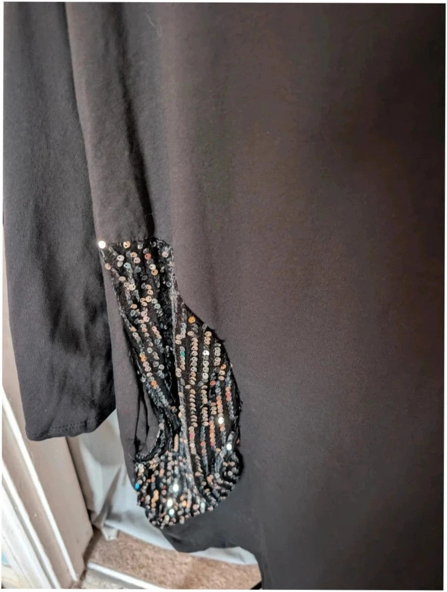 New Collection black tunic dress with silver sequin panels and relaxed crew neckline.