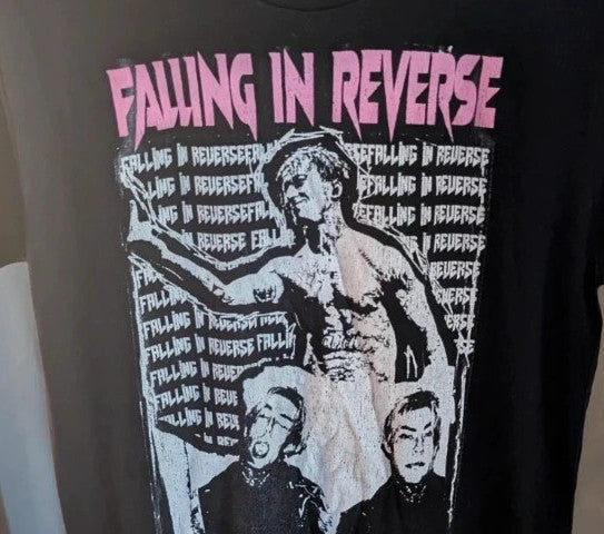 Next Level black graphic tee featuring pink Falling In Reverse logo and band portrait.