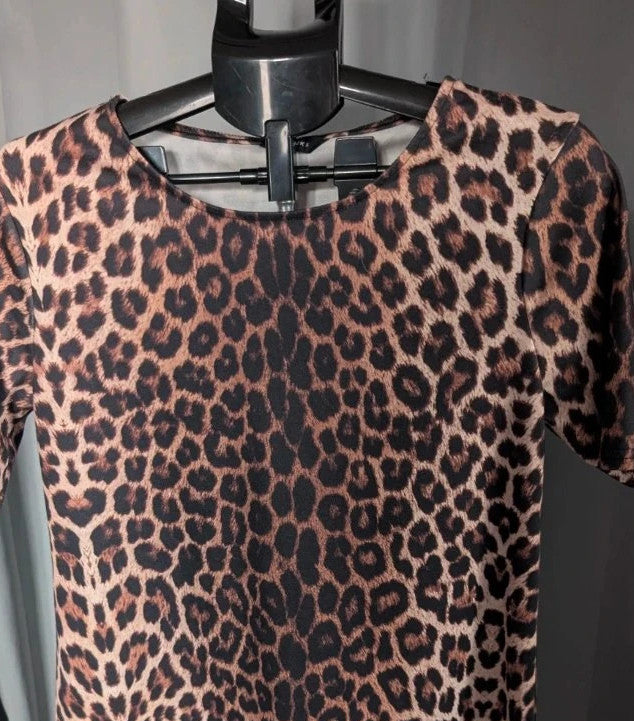 Peacocks leopard print shift mini dress in black and brown with short sleeves and scoop neckline.