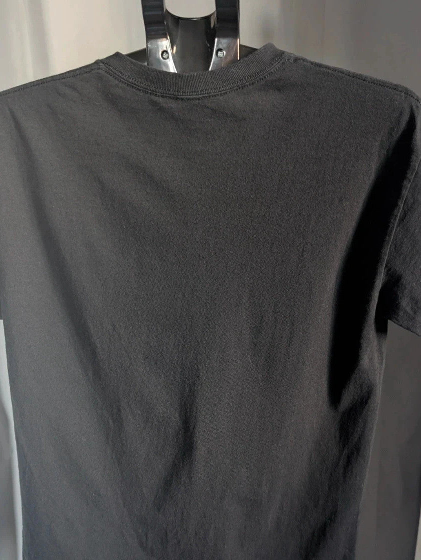 Naruto black graphic t-shirt featuring Kakashi Hatake, bubble typography, and Sharingan eye design.