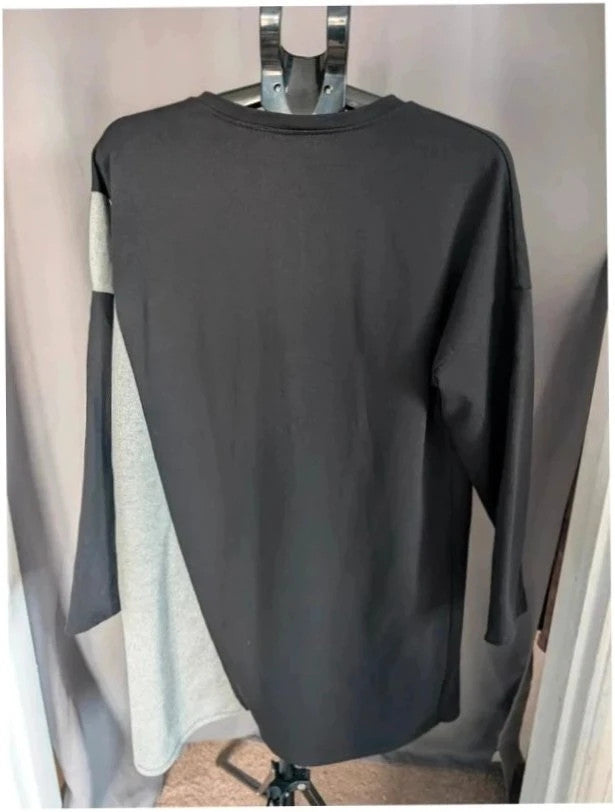 new collection made in Italy black grey asymmetric hoodie dress with metallic graphic print and zipper.