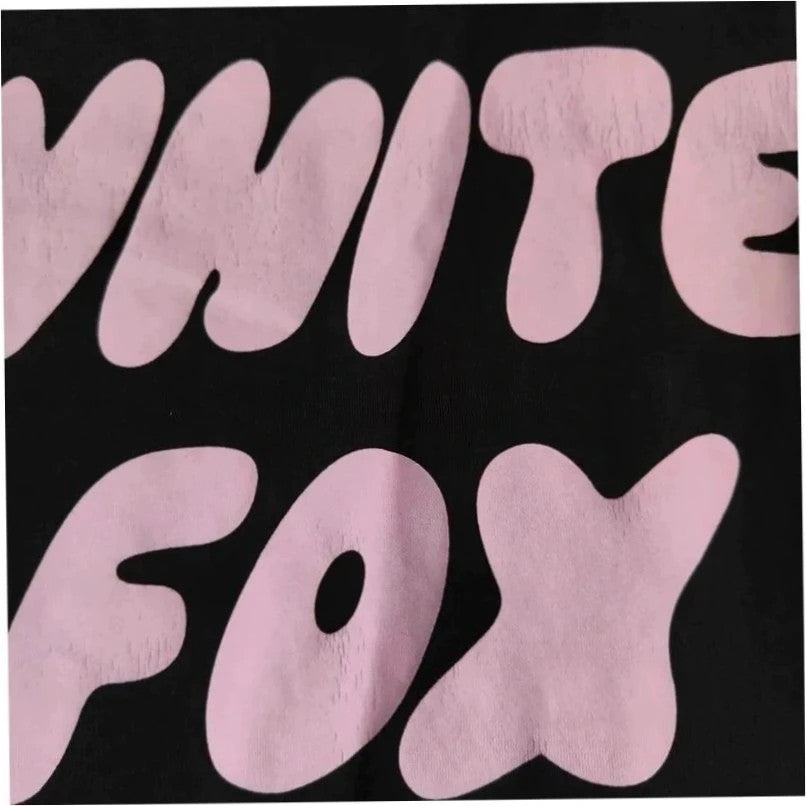White Fox black graphic t-shirt with neon pink "Vol.3" logo and ribbed neckline.