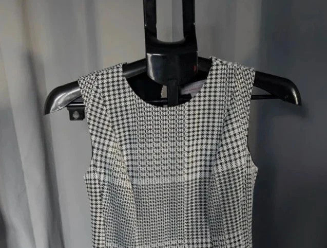 Dorothy Perkins black and white houndstooth shift dress with sleeveless design and back keyhole.