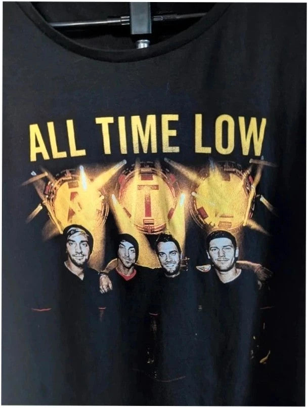 Continental black men's graphic t-shirt featuring bold yellow All Time Low logo print.