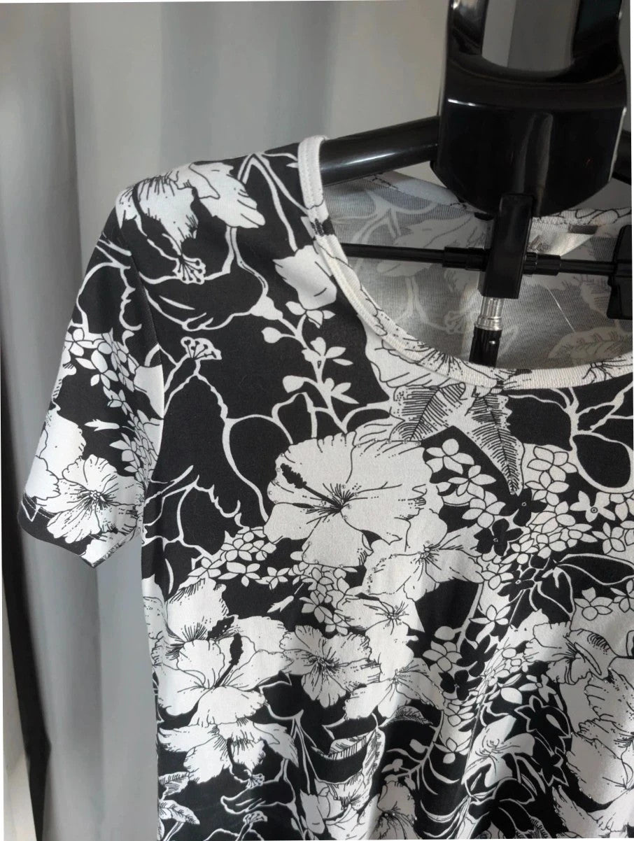 ISLE black white floral graphic t-shirt with rhinestone accents and hibiscus pattern.