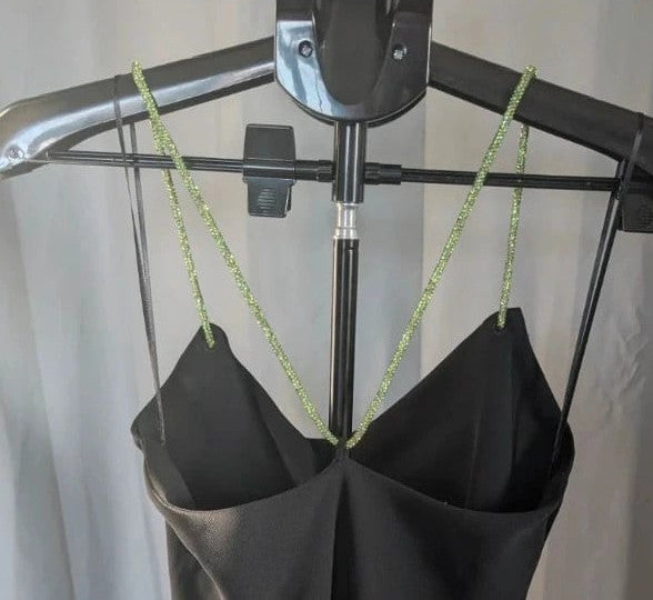 Zara black cowl neck slip dress with lime green rhinestone straps and smooth polyester fabric.