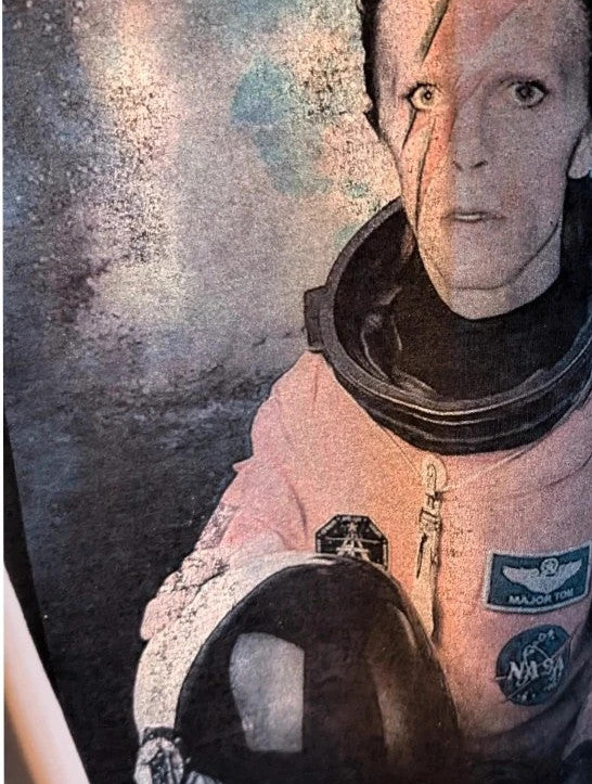 LaBarNa black graphic t-shirt featuring Ziggy Stardust lightning bolt astronaut print.
