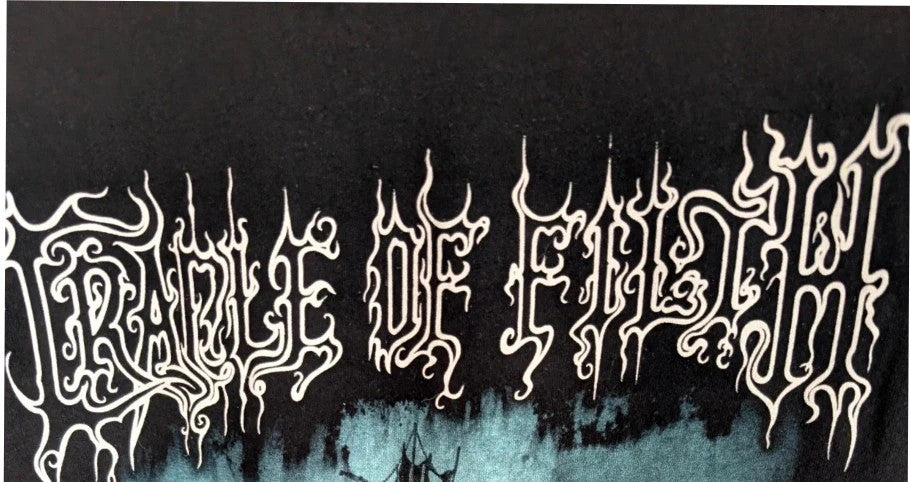 Official Cradle Of Filth black graphic tee featuring band portrait and tour dates on back.