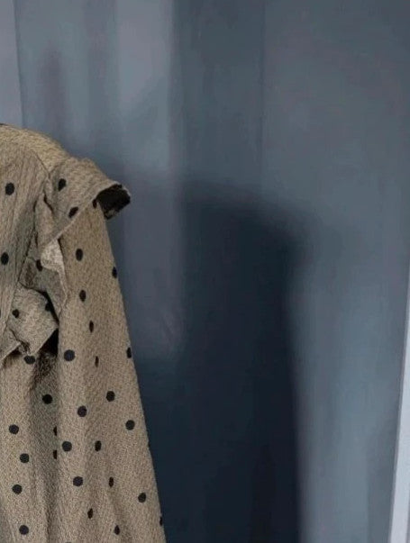 Primark khaki green polka dot tunic dress with ruffle sleeves and V-neckline.