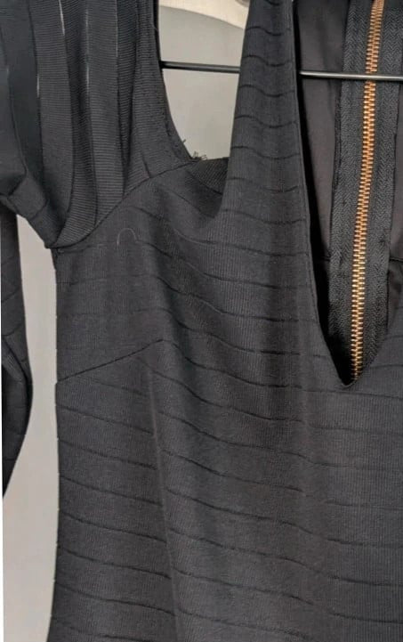 Miss Selfridge black bandage midi dress with cold shoulder cut-outs and gold zip detail.