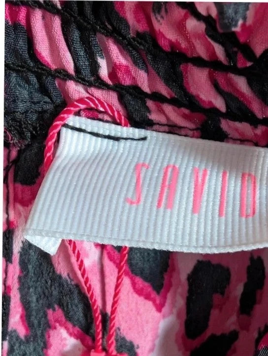 Savida pink and black leopard print mini dress with ruffle details and frill neckline.