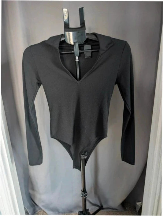 Select black ribbed long sleeve collared bodysuit with deep v-neck and popper fastenings.