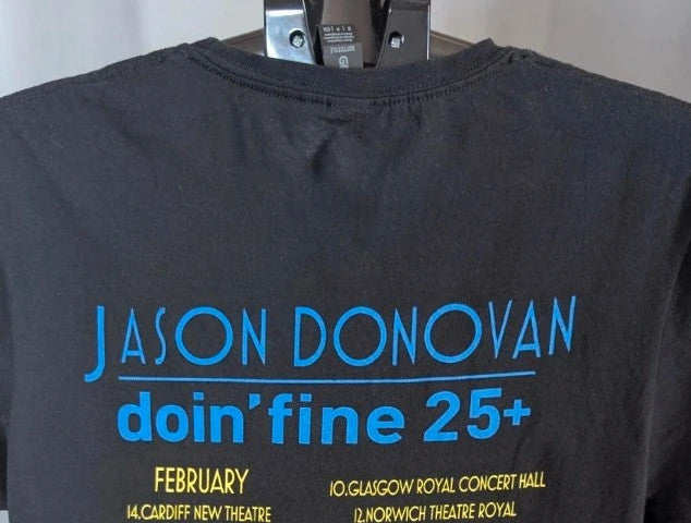 Official Jason Donovan black graphic t-shirt featuring Doin' Fine 25+ tour print and concert dates.