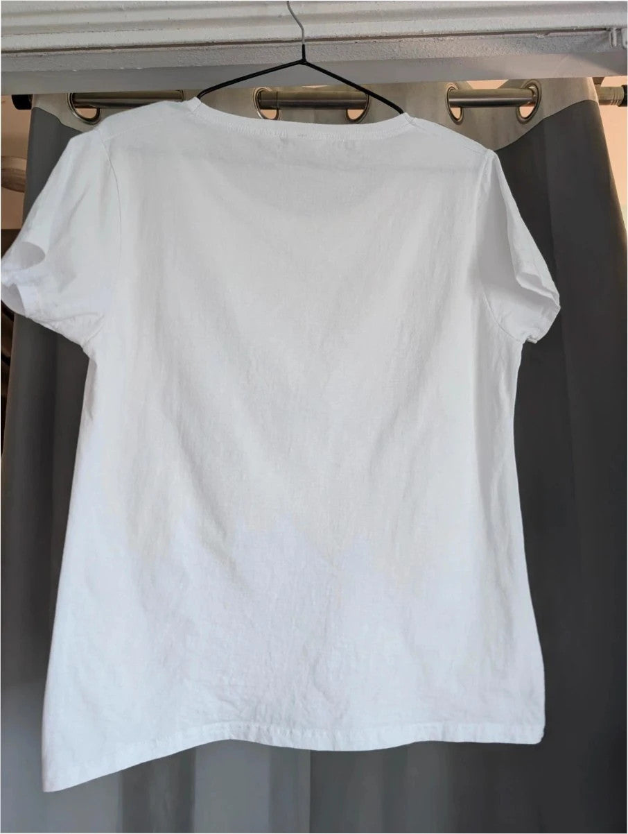 Marvel white graphic tee featuring Black Panther, Iron Man, and Captain America prints.