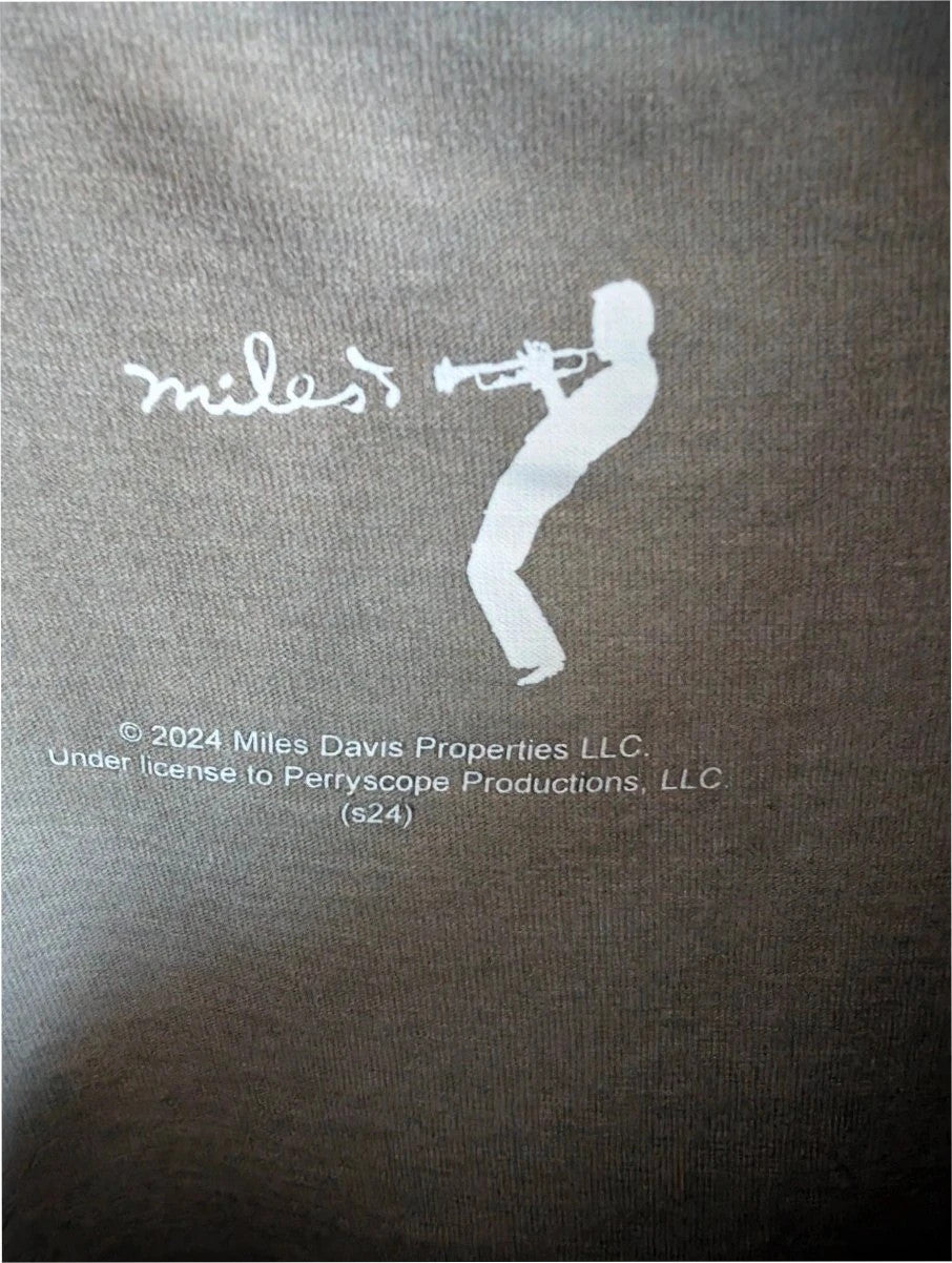 Miles Davis grey graphic t-shirt with "So What 1959" typography and trumpet artwork.