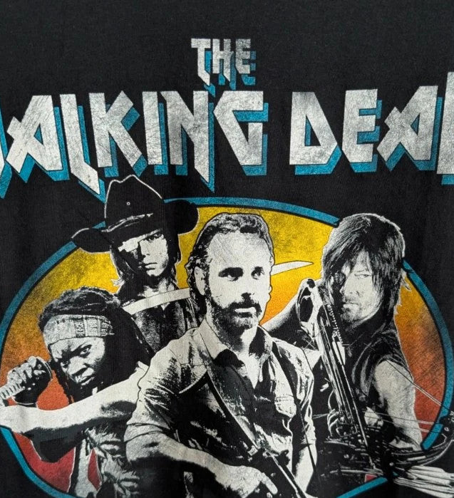 The Walking Dead black graphic tee featuring Rick, Daryl, Michonne, and Carl.