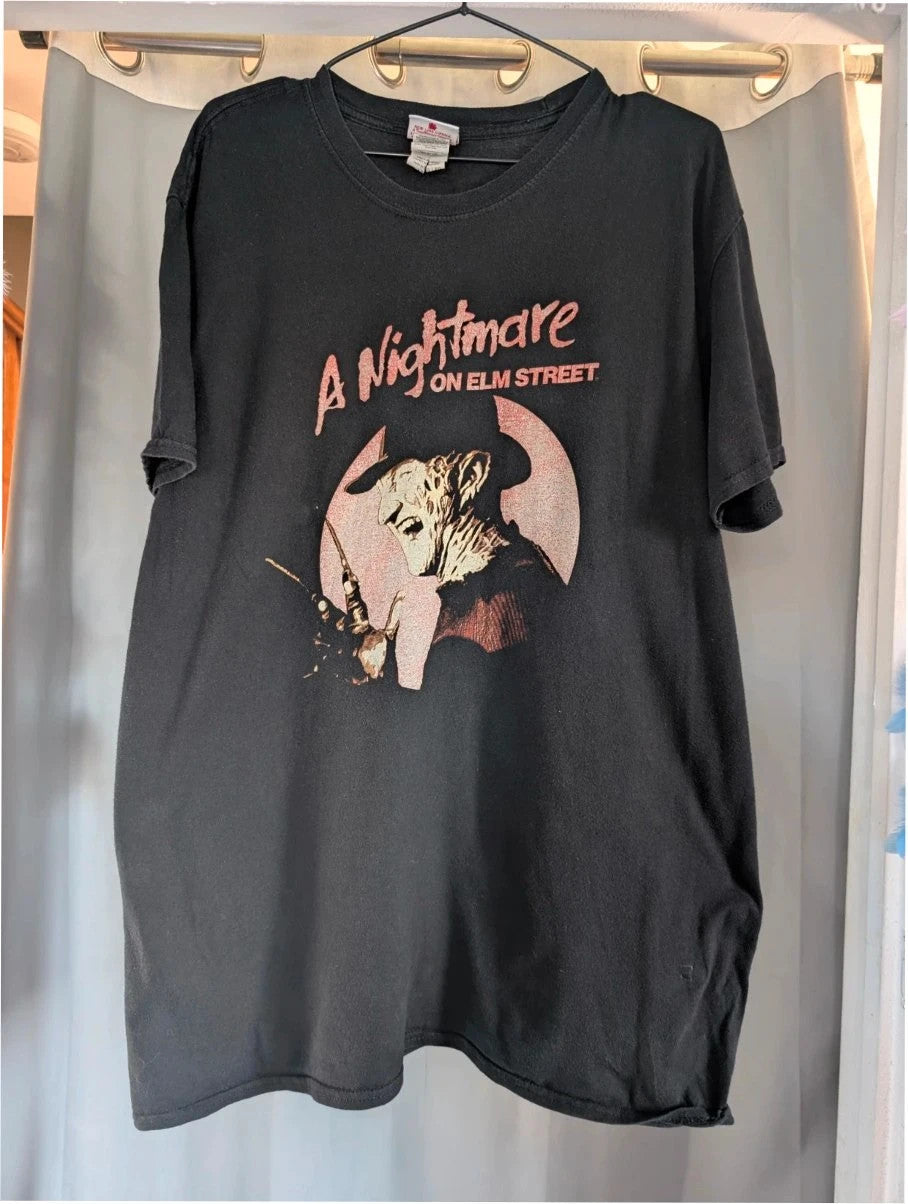 Gildan black graphic tee featuring Freddy Krueger print, soft 100% cotton material.