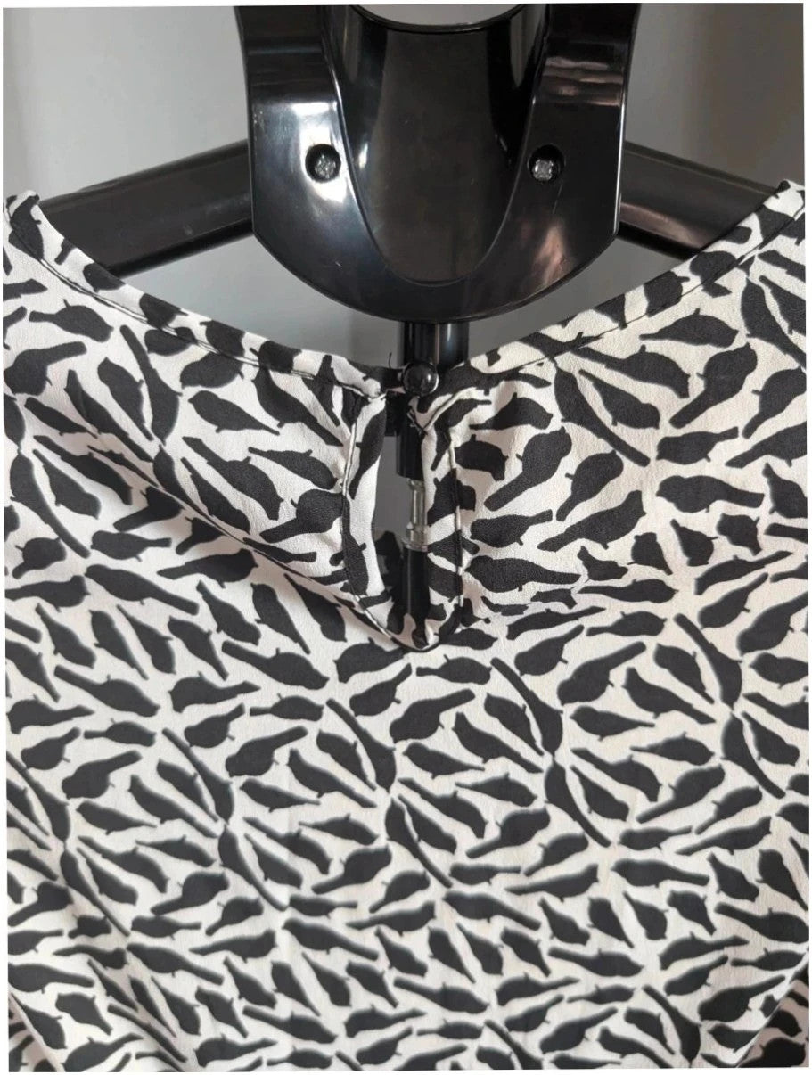 New Look black and white bird print mini dress with lace Peter Pan collar.