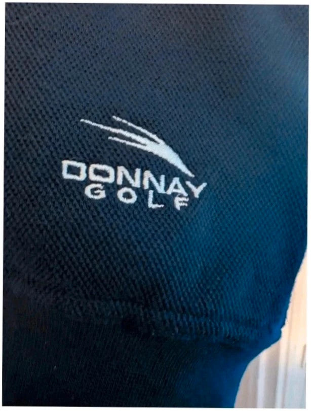 Donnay navy blue v-neck knitted sweater vest with embroidered logo and ribbed details.