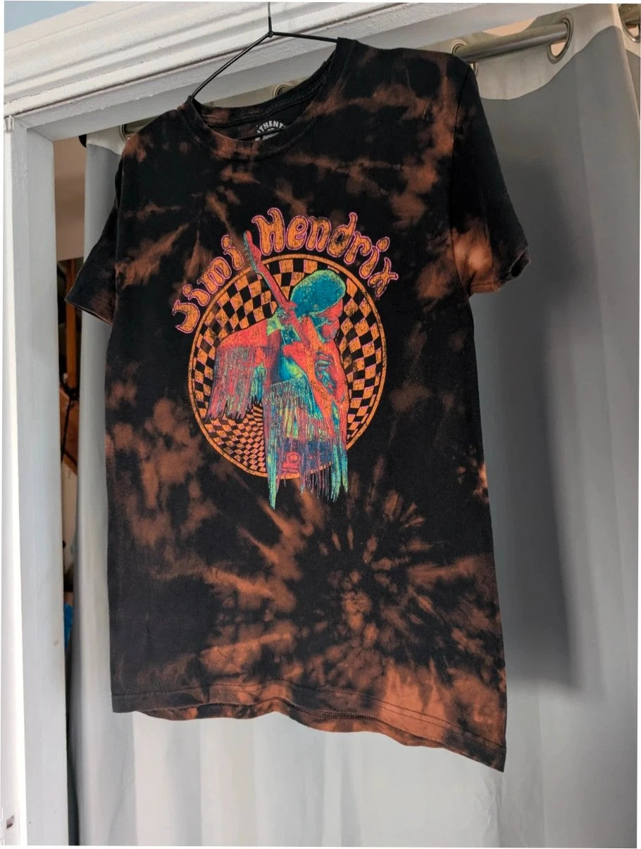 Hendrix graphic tee black bleach tie dye featuring vibrant Jimi Hendrix guitar design.