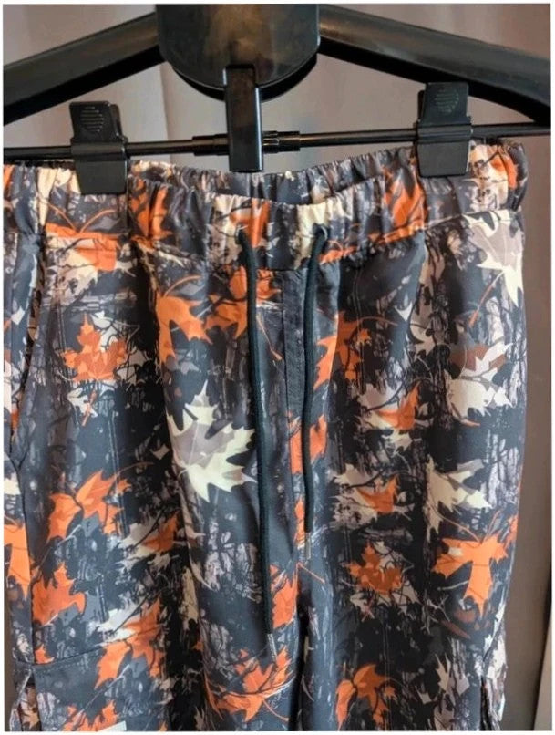 Crafted grey orange leaf camo cargo trousers with multiple pockets and elastic waistband.