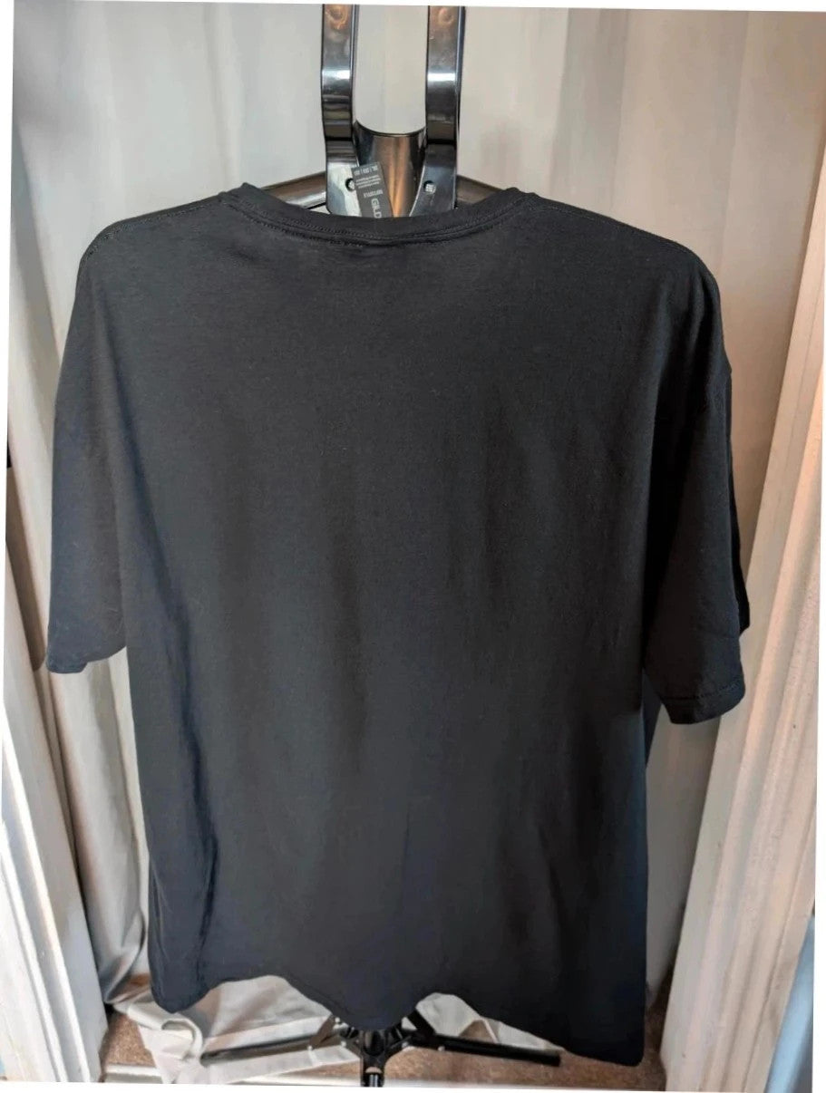 Poison black graphic tee featuring iconic skull and crossbones logo with green and white print.