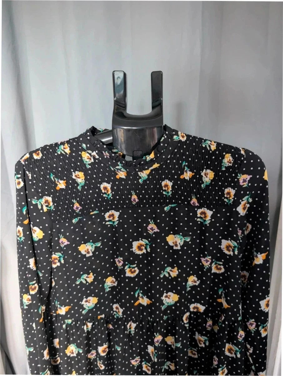 JDY black smock mini dress with floral and polka dot print, long sleeves, and keyhole back.
