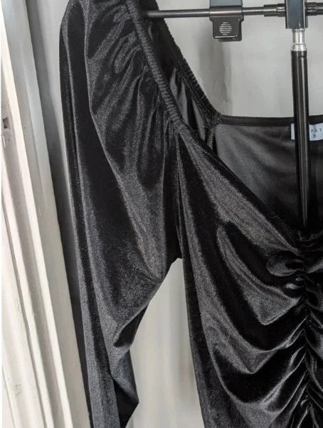 Papaya black stretch velvet tunic blouse with ruched sweetheart bustline and puff shoulders.