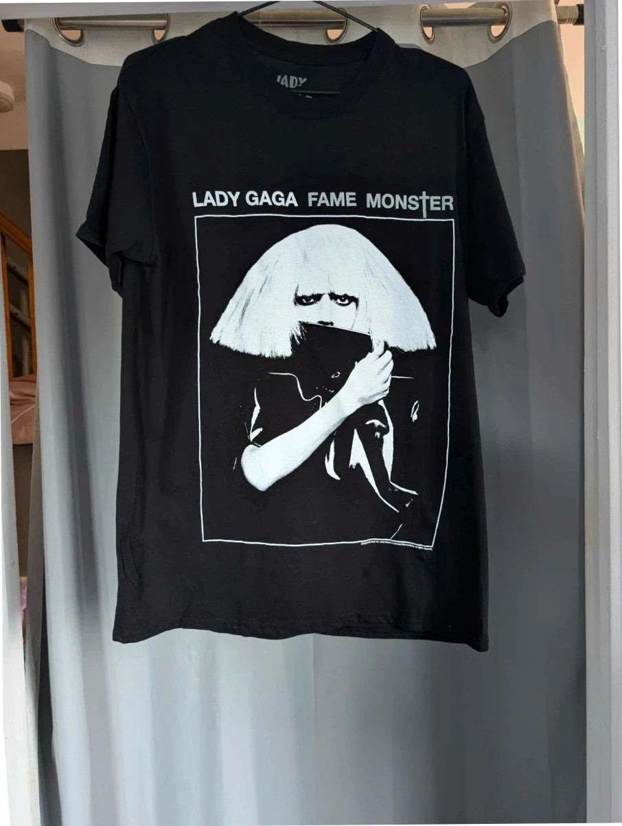 Lady Gaga black graphic t-shirt with white 'Fame Monster' print and crew neck.