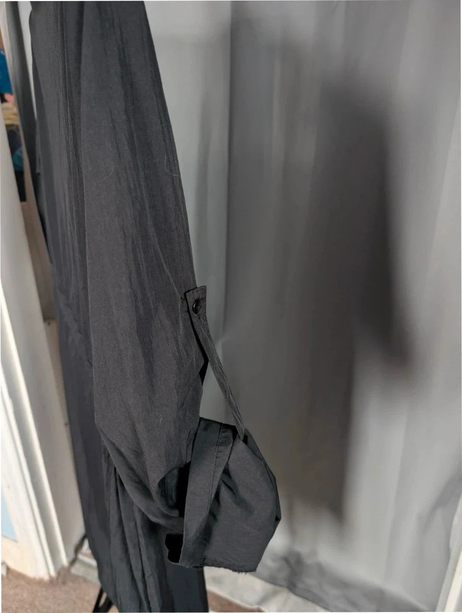 Shein Curve black utility shirt dress with O-ring zip, drawstring waist, and roll-tab sleeves.