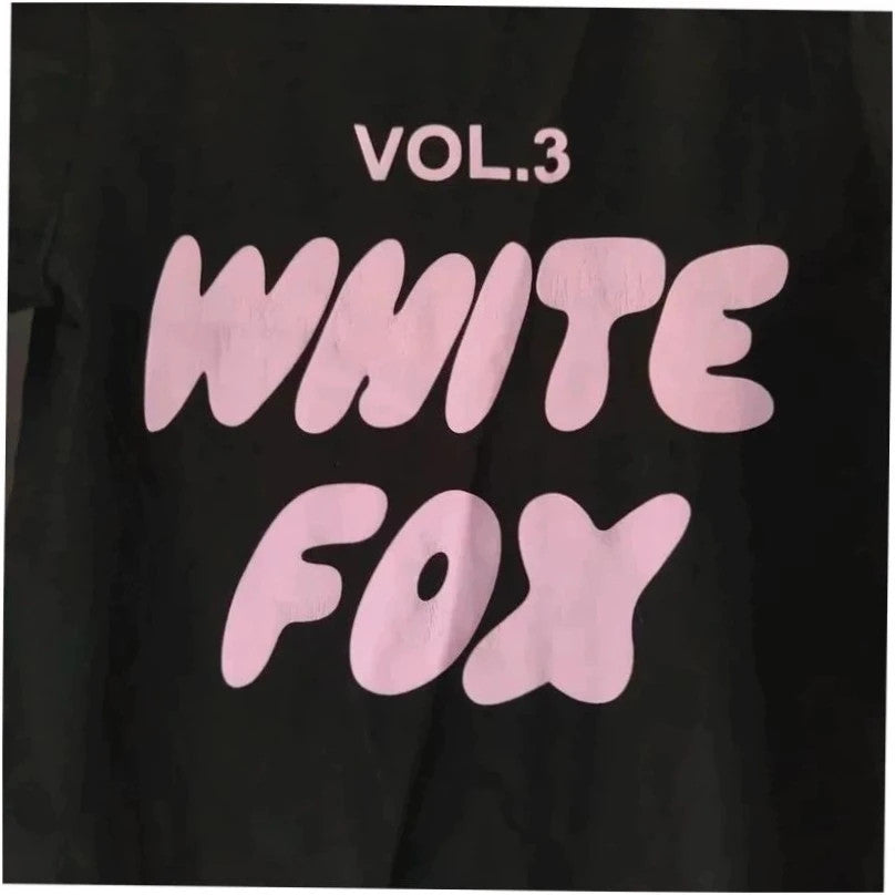 White Fox black graphic t-shirt with neon pink "Vol.3" logo and ribbed neckline.